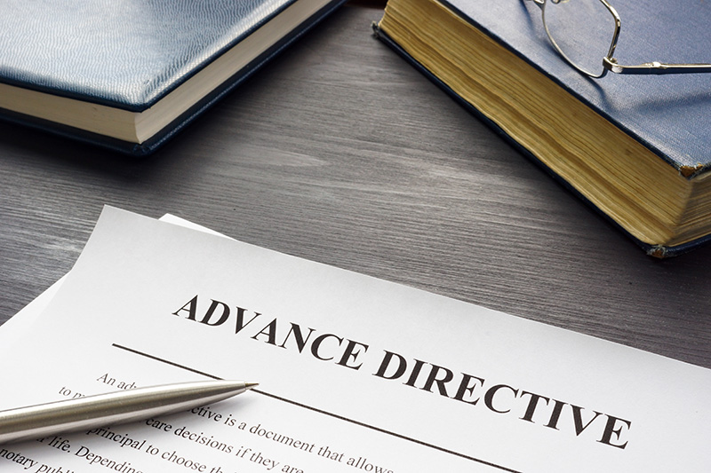 advance-directive Closeup of a pen and a piece of paper that says Advance Directive